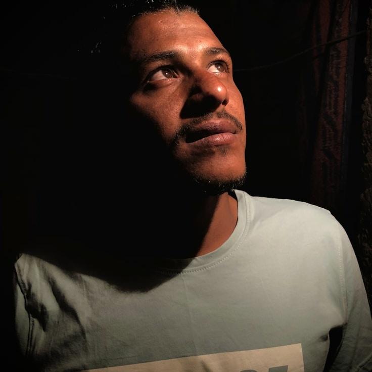 Avery Lin, Lead Design Curator at PaperPressFolio, reviewing corporate floral arrangements